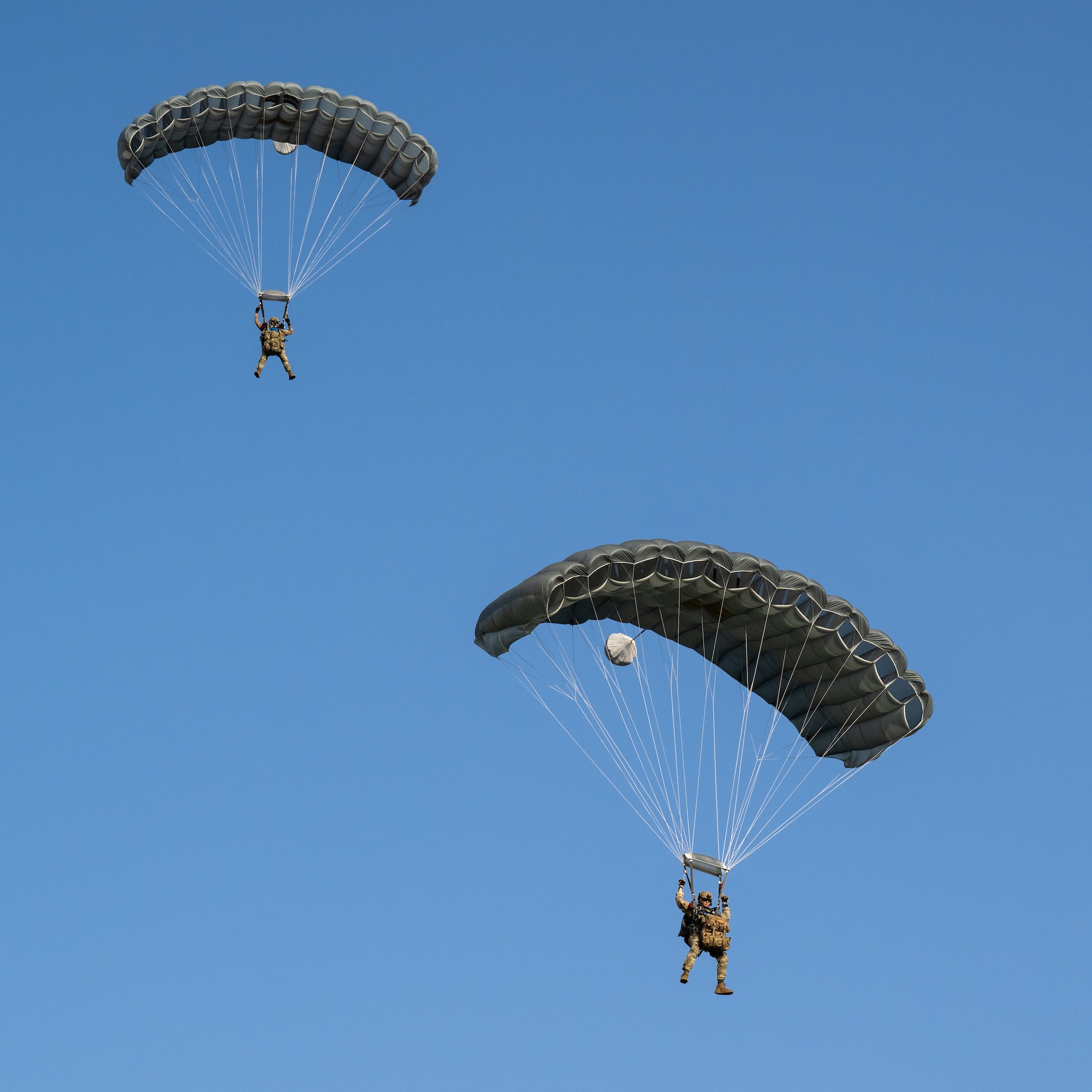 U.S. Air Force special tactics Airmen from the Kentucky Air National Guard’s 123rd Airlift Wing parachute into Henry E. Rohlsen Airport near Christiansted in St. Croix, U.S. Virgin Islands, Aug. 26, 2025 as part of Emerald Warrior 25.2, a large-scale special operations exercise being staged in multiple locations by Air Force Special Operations Command. The Airmen, joined by nine other combat controllers and pararescuemen, took control of the airfield to receive follow-on aircraft in support of simulated combat and contingency operations. (U.S. Air National Guard photo by Dale Greer)