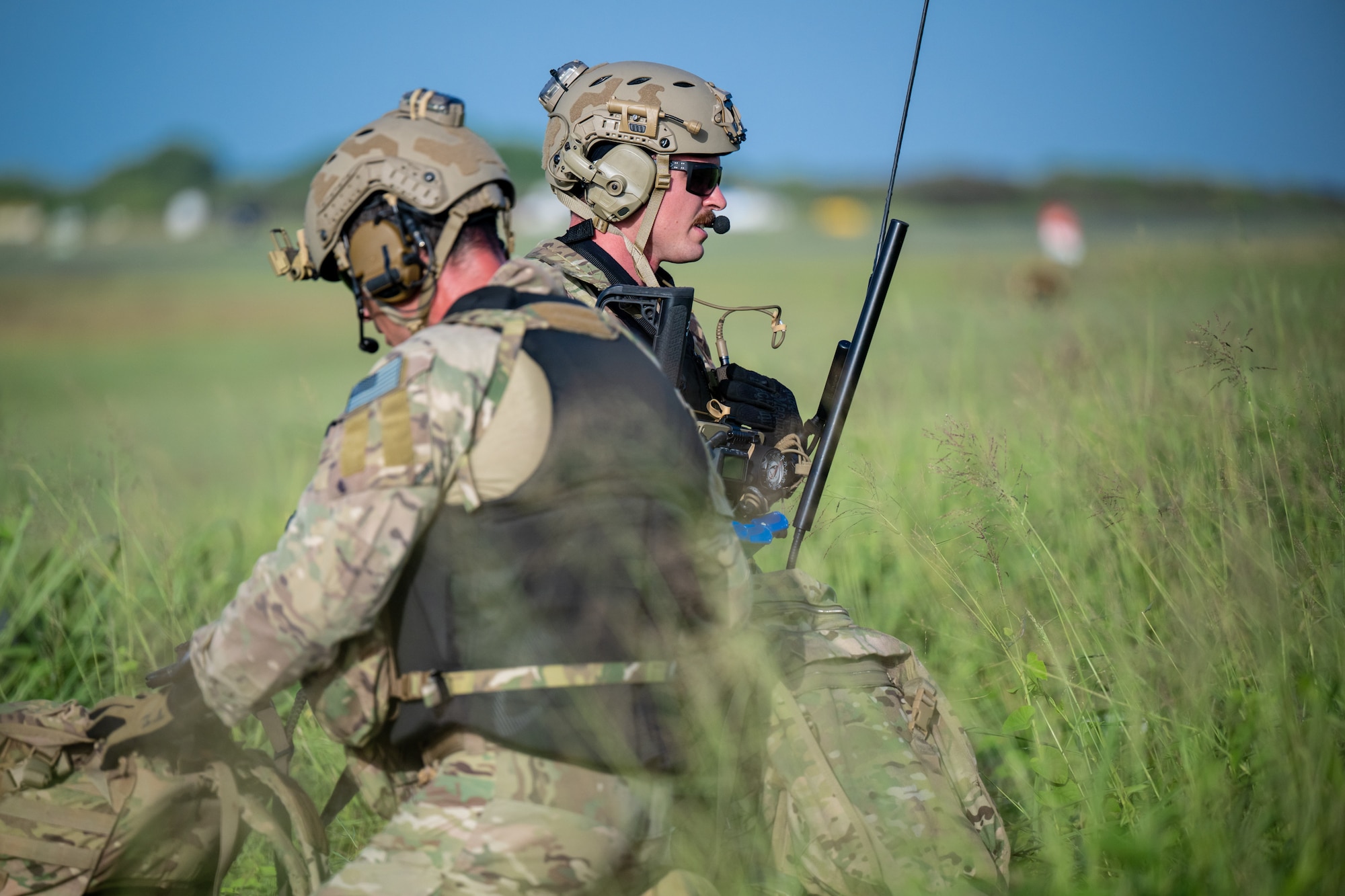 U.S. Air Force special tactics Airmen from the Kentucky Air National Guard’s 123rd Airlift Wing establish air traffic control at Henry E. Rohlsen Airport near Christiansted in St. Croix, U.S. Virgin Islands, Aug. 26, 2025 as part of Emerald Warrior 25.2, a large-scale special operations exercise being staged in multiple locations by Air Force Special Operations Command. The Airmen are among a group of combat controllers and pararescuemen who parachuted into the airfield minutes earlier from a Kentucky Air Guard C-130J Super Hercules. (U.S. Air National Guard photo by Dale Greer)