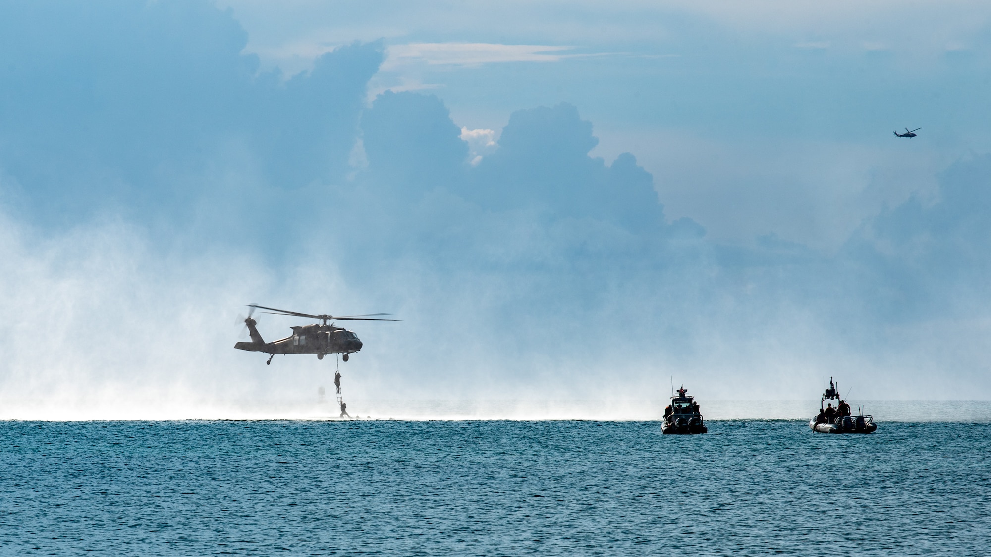 U.S. Air Force special tactics Airmen from the Kentucky Air National Guard’s 123rd Airlift Wing conduct exfil operations from the Caribbean Sea into a Mississippi Army National Guard UH-60 Black Hawk off the coast of St. Croix, U.S. Virgin Islands, Aug. 28, 2025 as part of Emerald Warrior 25.2, a large-scale special operations exercise staged in multiple locations by Air Force Special Operations Command. St. Croix provides an ideal environment for testing the unit’s littoral and maritime capabilities, simulating many of the geographic features that special operators may encounter when deployed around the world to project air power in unfamiliar or contested environments. (U.S. Air National Guard photo by Phil Speck)