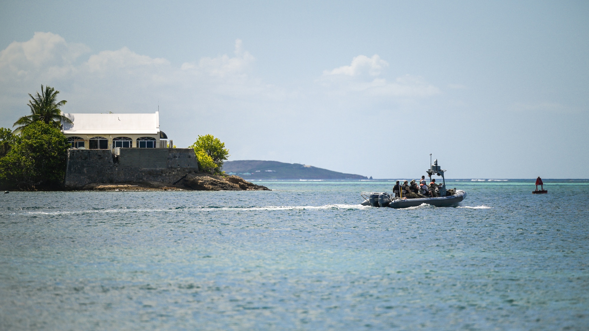 U.S. Air Force special tactics Airmen from the Kentucky Air National Guard’s 123rd Airlift Wing depart Christiansted Harbor, U.S. Virgin Islands, to conduct a reconnaissance mission on another island 75 nautical miles away Aug. 27, 2025 as part of Emerald Warrior 25.2, a large-scale special operations exercise staged in multiple locations by Air Force Special Operations Command. The Caribbean provides an ideal environment for testing the unit’s littoral and maritime capabilities, simulating many of the geographic features that special operators may encounter when deployed around the world to project air power in unfamiliar or contested environments. (U.S. Air National Guard photo by Dale Greer)
