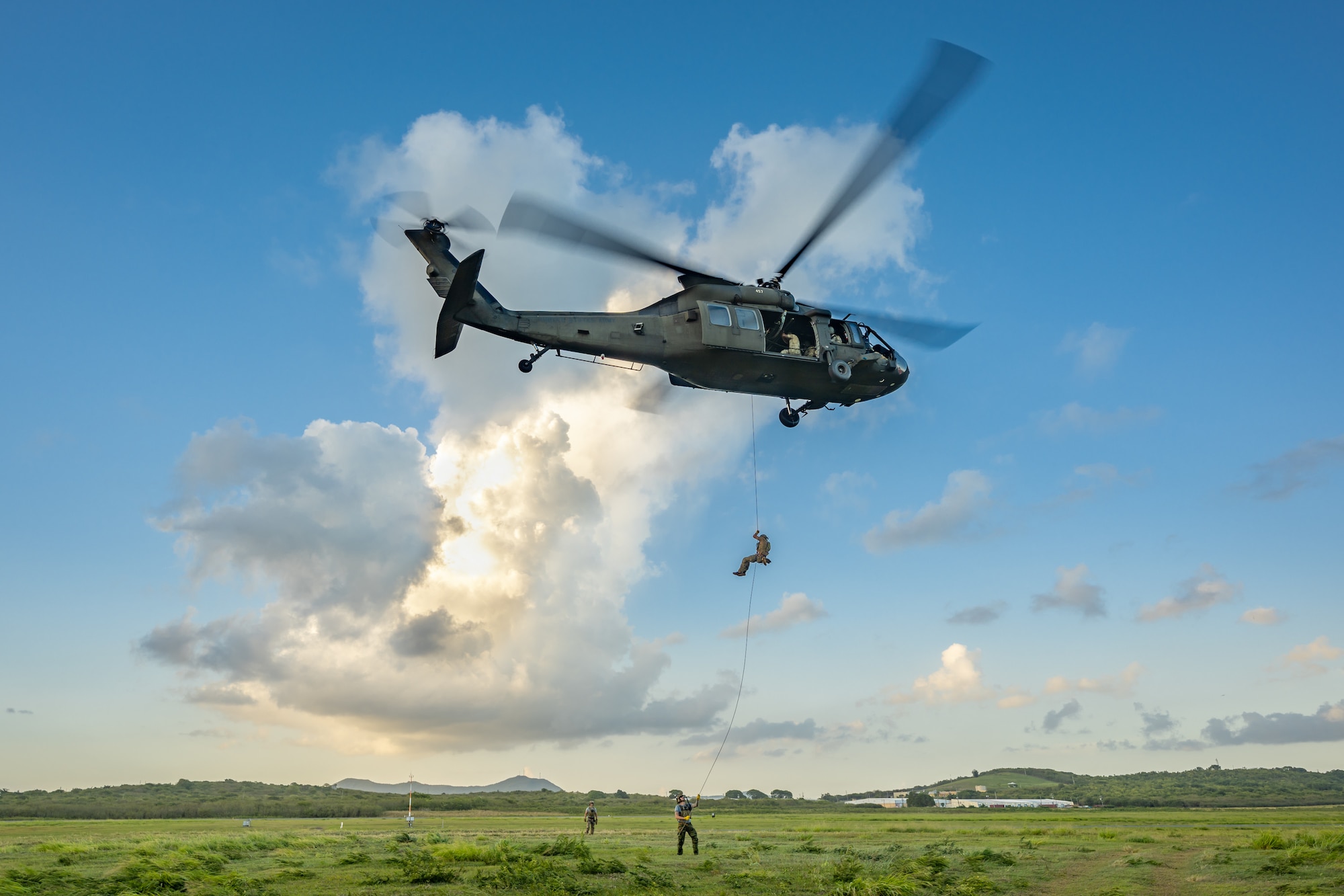 U.S. Air Force special tactics Airmen from the Kentucky Air National Guard’s 123rd Airlift Wing conduct fast rope operations from a Mississippi Army National Guard UH-60 Black Hawk on the island of St. Croix, U.S. Virgin Islands, Aug. 27, 2025 as part of Emerald Warrior 25.2, a large-scale special operations exercise staged in multiple locations by Air Force Special Operations Command. St. Croix provides an ideal environment for testing the unit’s littoral and maritime capabilities, simulating many of the geographic features that special operators may encounter when deployed around the world to project air power in unfamiliar or contested environments. (U.S. Air National Guard photo by Dale Greer)
