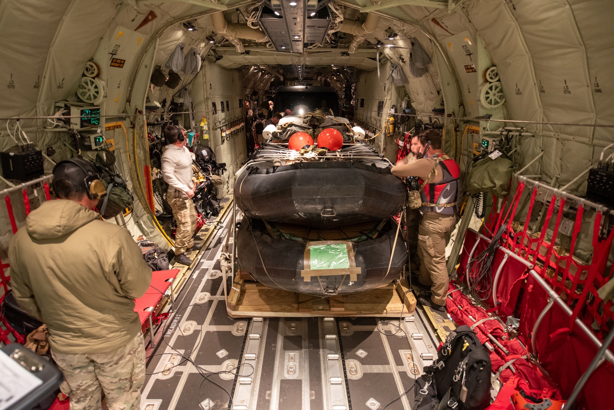 U.S. Air Force special tactics Airmen from the Kentucky Air National Guard’s 123rd Airlift Wing prepare boats and to be airdropped from the wing’s C-130J Super Hercules over St. Croix, U.S. Virgin Islands, Aug. 26, 2025 as part of Emerald Warrior 25.2, a large-scale special operations exercise being staged in multiple locations by Air Force Special Operations Command. St. Croix provides an ideal environment for testing the unit’s littoral and maritime capabilities, simulating many of the geographic features that special operators may encounter when deployed around the world to project air power in unfamiliar or contested environments. (U.S. Air National Guard photo by Phil Speck)