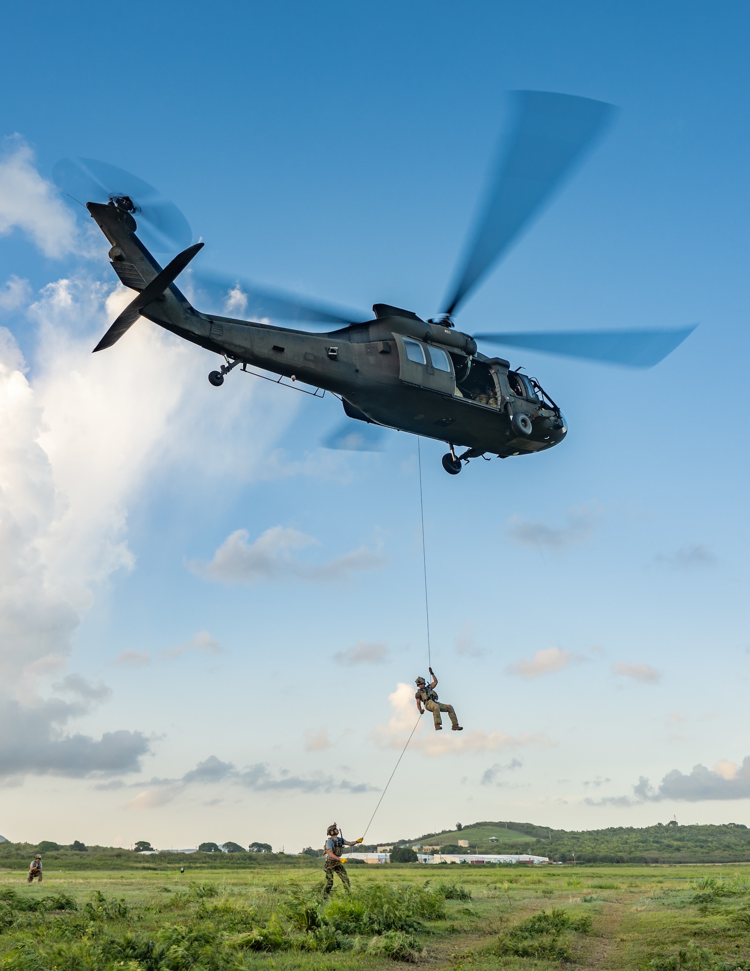 U.S. Air Force special tactics Airmen from the Kentucky Air National Guard’s 123rd Airlift Wing conduct fast rope operations from a Mississippi Army National Guard UH-60 Black Hawk on the island of St. Croix, U.S. Virgin Islands, Aug. 27, 2025 as part of Emerald Warrior 25.2, a large-scale special operations exercise staged in multiple locations by Air Force Special Operations Command. St. Croix provides an ideal environment for testing the unit’s littoral and maritime capabilities, simulating many of the geographic features that special operators may encounter when deployed around the world to project air power in unfamiliar or contested environments. (U.S. Air National Guard photo by Dale Greer)
