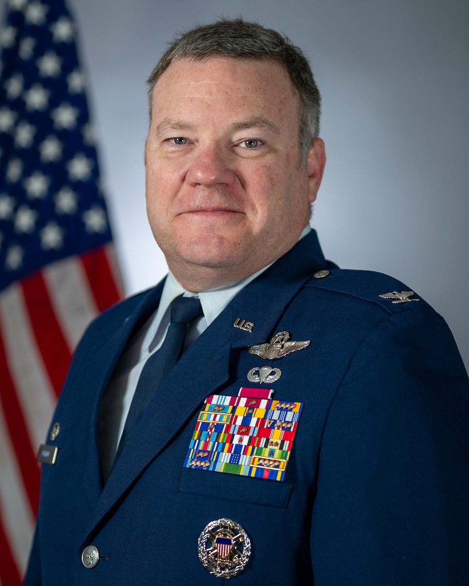 man poses for studio photo