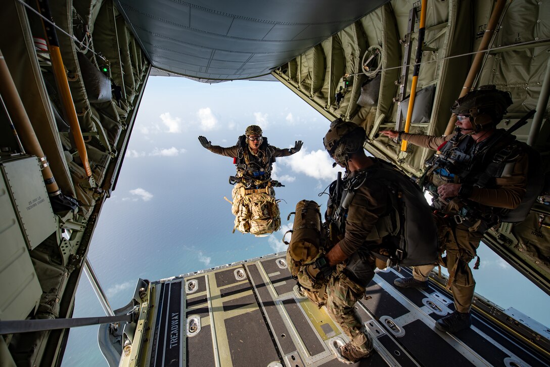 A U.S. Air Force special tactics Airman from the Kentucky Air National Guard’s 123rd Airlift Wing jumps into Henry E. Rohlsen Airport near Christiansted in St. Croix, U.S. Virgin Islands, Aug. 26, 2025 as part of Emerald Warrior 25.2, a large-scale special operations exercise being staged in multiple locations by Air Force Special Operations Command. The Airman, joined by 10 other combat controllers and pararescuemen, took control of the airfield to receive follow-on aircraft in support of simulated combat and contingency operations. (U.S. Air National Guard photo by Phil Speck)