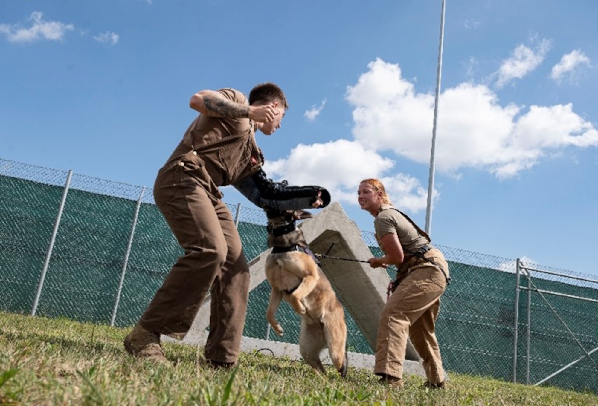 K-9 handlers with dog
