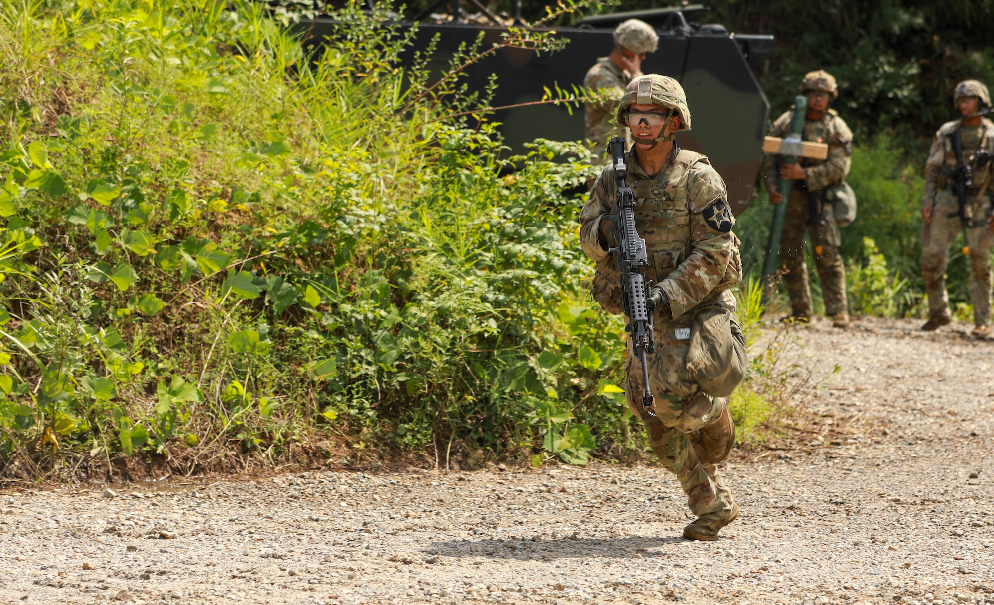 Man runs during military training.