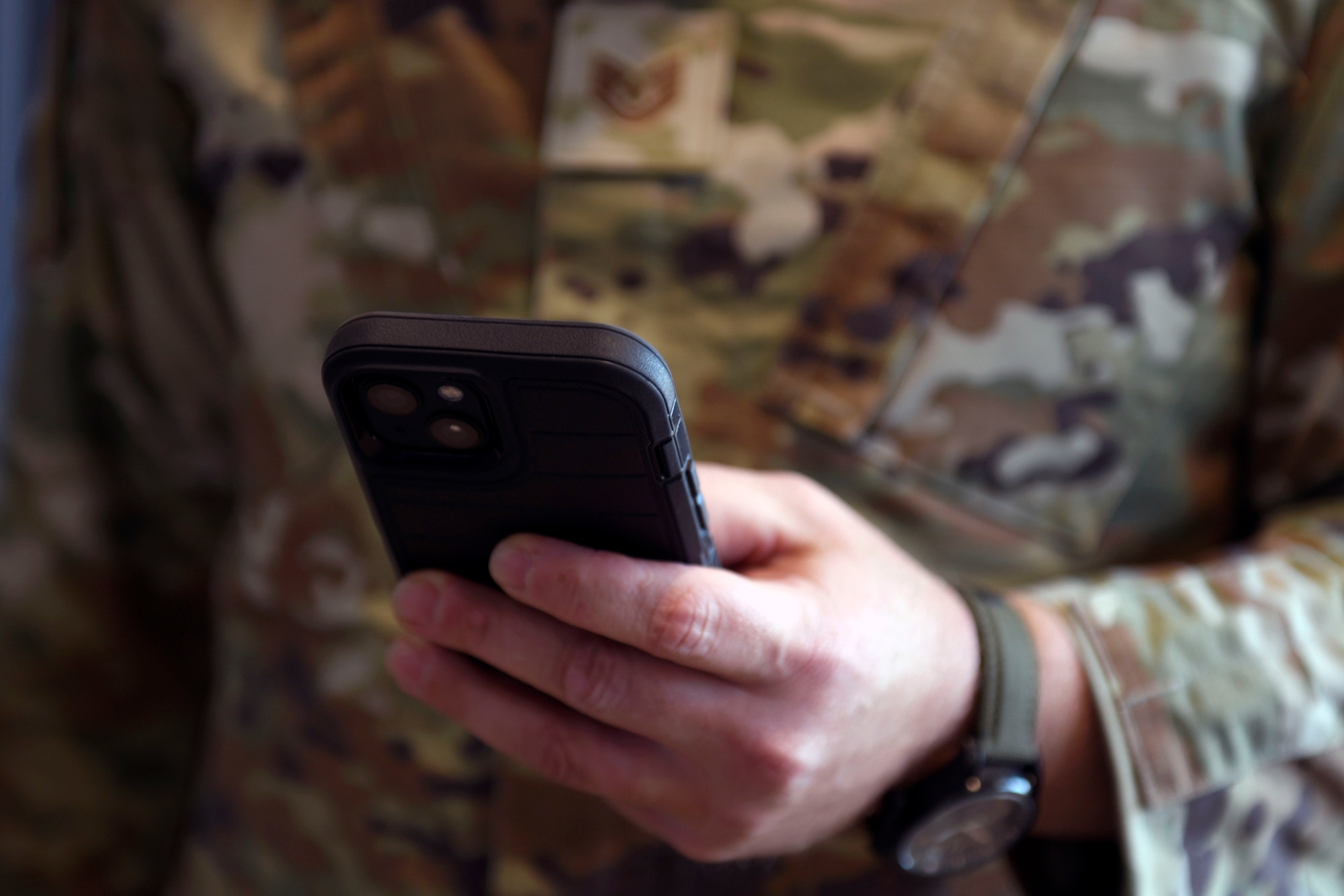 A technical sergeant simulates a phone conversation Sept. 4, 2025, at the Russell Knox Building in Quantico, Virginia.