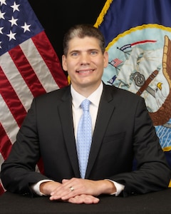 Mr. Howard A. Berkof, Acting Executive Director for Program Executive Officer for Integrated Warfare Systems