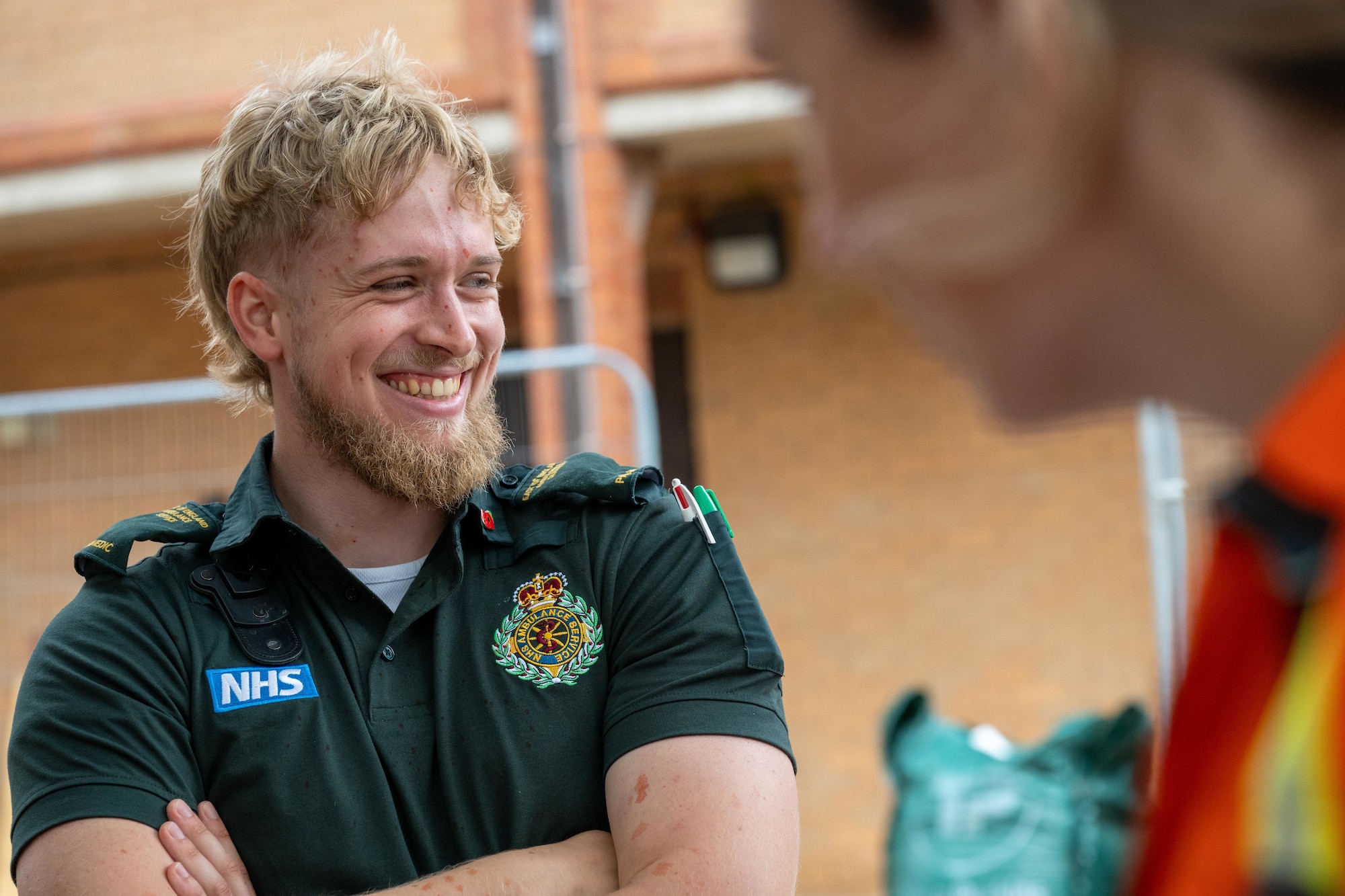 A UK paramedic smiles