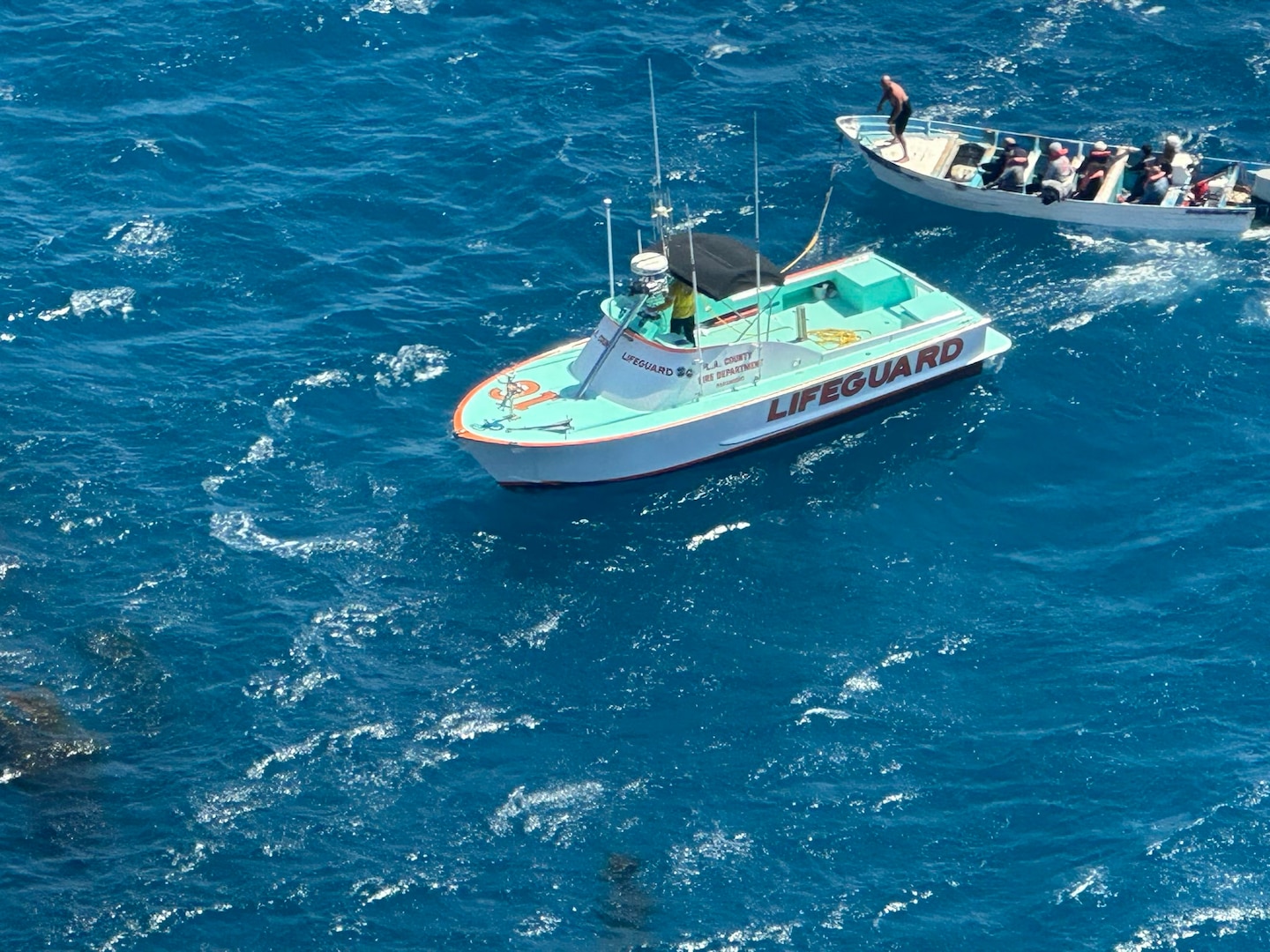 Baywatch Avalon tows disabled migrant vessel