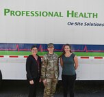 (Left to Right) Ashley Armes, Administrative Services Assistant, 
LTC Kathyrn Werback, Walla Walla District Commander, with Hannah Boudreaux, Safety and Occupational Health Nurse and Program Manager, outside the mobile health clinic at Lower Granite Lock and Dam.