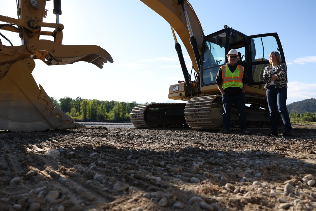 A contractor discusses rehabilitation efforts with Julie Balten (right), deputy district engineer, Walla Walla District, U.S. Army Corps of Engineers, at the Jackson Levees, Aug. 21, 2025, emphasizing the collaborative efforts of civilian contractors and USACE. More than 10,000 residents, along with homes, businesses, emergency facilities and farmland, are protected annually due to ongoing rehabilitation efforts on the Jackson Levees from the Walla Walla District, U.S. Army Corps of Engineers.