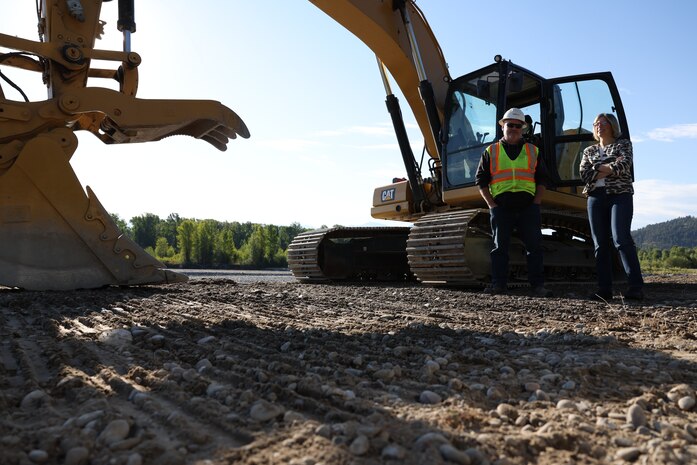 A contractor discusses rehabilitation efforts with Julie Balten (right), deputy district engineer, Walla Walla District, U.S. Army Corps of Engineers, at the Jackson Levees, Aug. 21, 2025, emphasizing the collaborative efforts of civilian contractors and USACE. More than 10,000 residents, along with homes, businesses, emergency facilities and farmland, are protected annually due to ongoing rehabilitation efforts on the Jackson Levees from the Walla Walla District, U.S. Army Corps of Engineers.