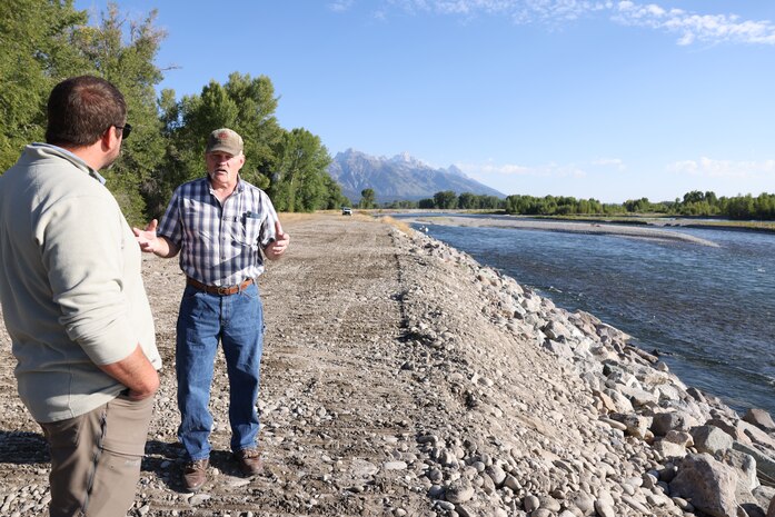 Kenny Koebberling (right), project manager, Walla Walla District, U.S. Army Corps of Engineers, discusses Jackson Levees rehabilitation efforts with Chris Silbernagel, the operating program manager for Lucky Peak Dam near Boise, Idaho, Aug. 21, 2025, stressing the significance of teamwork in the Walla Walla District's long-term success. More than 10,000 residents, along with homes, businesses, emergency facilities and farmland, are protected annually due to ongoing rehabilitation efforts on the Jackson Levees.