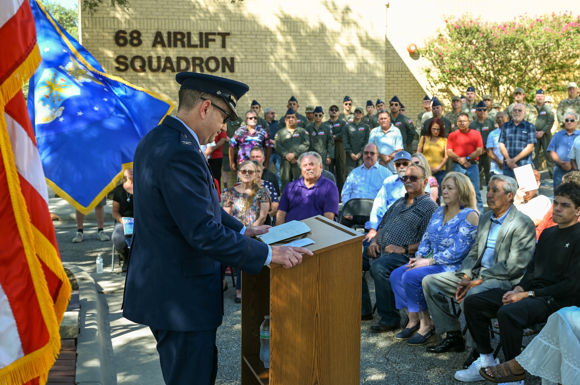 Col. Douglas Jeffrey, 433rd Airlift Wing commander, delivers remarks during a remembrance ceremony outside the 68th Airlift Squadron building on Joint Base San Antonio-Lackland, Texas Aug. 29, 2025.