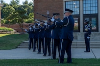 The U.S. Air Force Honor Guard Firing Party conducts a three-volley salute during a funeral demonstration to attendees of an immersion tour at Joint Base Anacostia-Bolling, Washington, D.C., Aug. 26, 2025. The tour gave new JBAB and Air Force District of Washington leadership firsthand insight on the operations of the Honor Guard whose mission is to deliver premier ceremonial honors, inspire the nation, and represent all Airmen and Guardians to the world. (U.S. Air Force photo by Hayden Hallman)