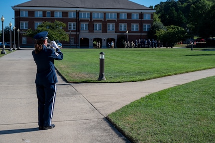 U.S. Air Force Master Sgt. Kristin J. Cazenave, a trumpeter with The U.S. Air Force Band’s Ceremonial Brass, plays taps during a funeral demonstration to attendees of an immersion tour at Joint Base Anacostia-Bolling, Washington, D.C., Aug. 26, 2025. The tour gave new JBAB and Air Force District of Washington leadership firsthand insight on the operations of the Ceremonial Brass which is to provide musical support for funerals at Arlington National Cemetery, foreign heads of state at the White House and Pentagon, patriotic programs, change of commands, and retirement and award ceremonies. (U.S. Air Force photo by Hayden Hallman)
