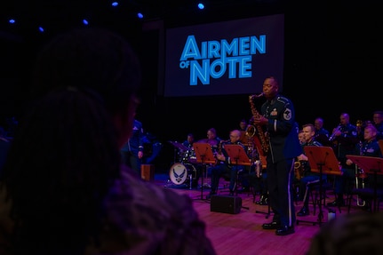 U.S. Air Force Senior Master Sgt. Grant M. Langford, a saxophonist with The U.S. Air Force Band’s Airmen of Note, performs for attendees of an immersion tour at Joint Base Anacostia-Bolling, Washington, D.C., Aug. 26, 2025. The Airmen of Note’s mission, as a part of The U.S. Air Force Band, is to honor those who have served, inspire American citizens to heightened patriotism and service, and connect the global community on behalf of the U.S. Air Force and the United States. (U.S. Air Force photo by Hayden Hallman)
