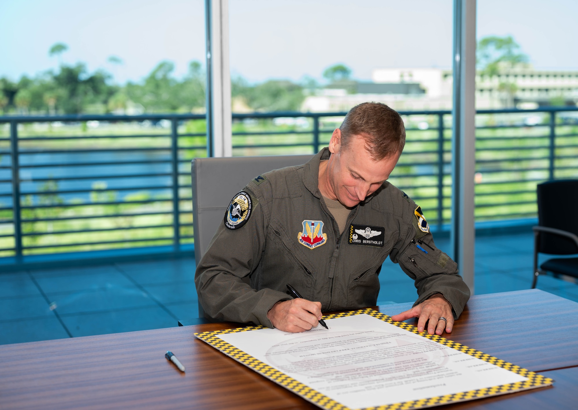 U.S. Air Force Col. Christian M. Bergtholdt 325th Fighter Wing commander signs a proclamation recognizing September as National Preparedness Month