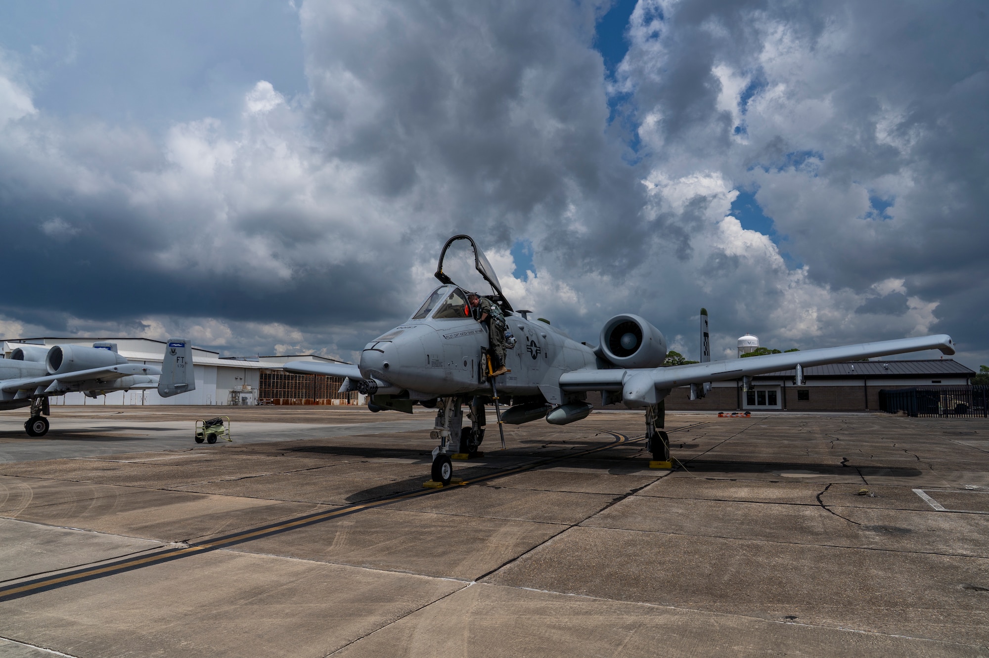 A military airplane stands on the Keesler airfield.