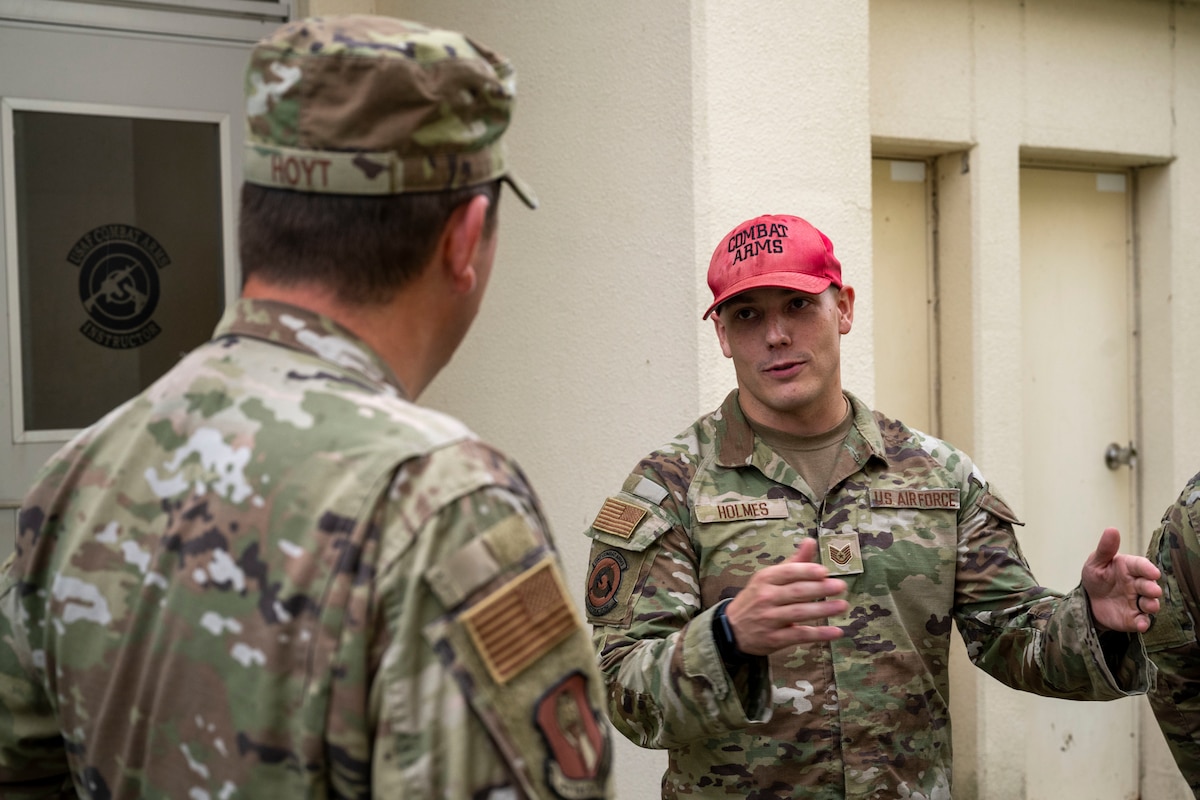 U.S. Air Force Tech. Sgt. Donald Holmes, right, 35th Security Forces Squadron combat arms training and maintenance section chief, describes his duties to Col. Matthew Hoyt, 35th Fighter Wing (FW) deputy commander, during an immersion tour at Misawa Air Base, Japan, Sept. 2, 2025.