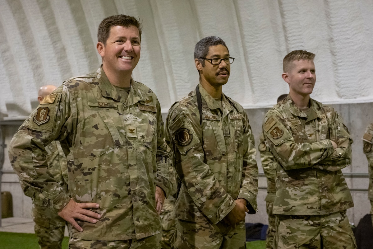 From left, U.S. Air Force Col. Matthew Hoyt, 35th Fighter Wing deputy commander, Staff Sgt. Randle Williams, 35th Security Forces Squadron military working dog trainer, and Col. Paul Conner, 35th Mission Support Group commander, watch military working dog training during an immersion tour at Misawa Air Base, Japan, Sept. 2, 2025.