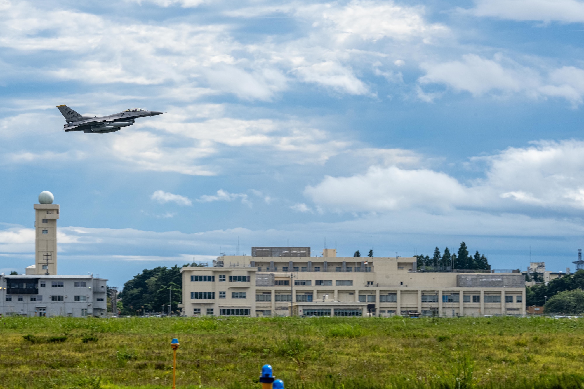 A U.S. Air Force F-16 Fighting Falcon assigned to the 13th Fighter Squadron (FS) takes off for the last time.