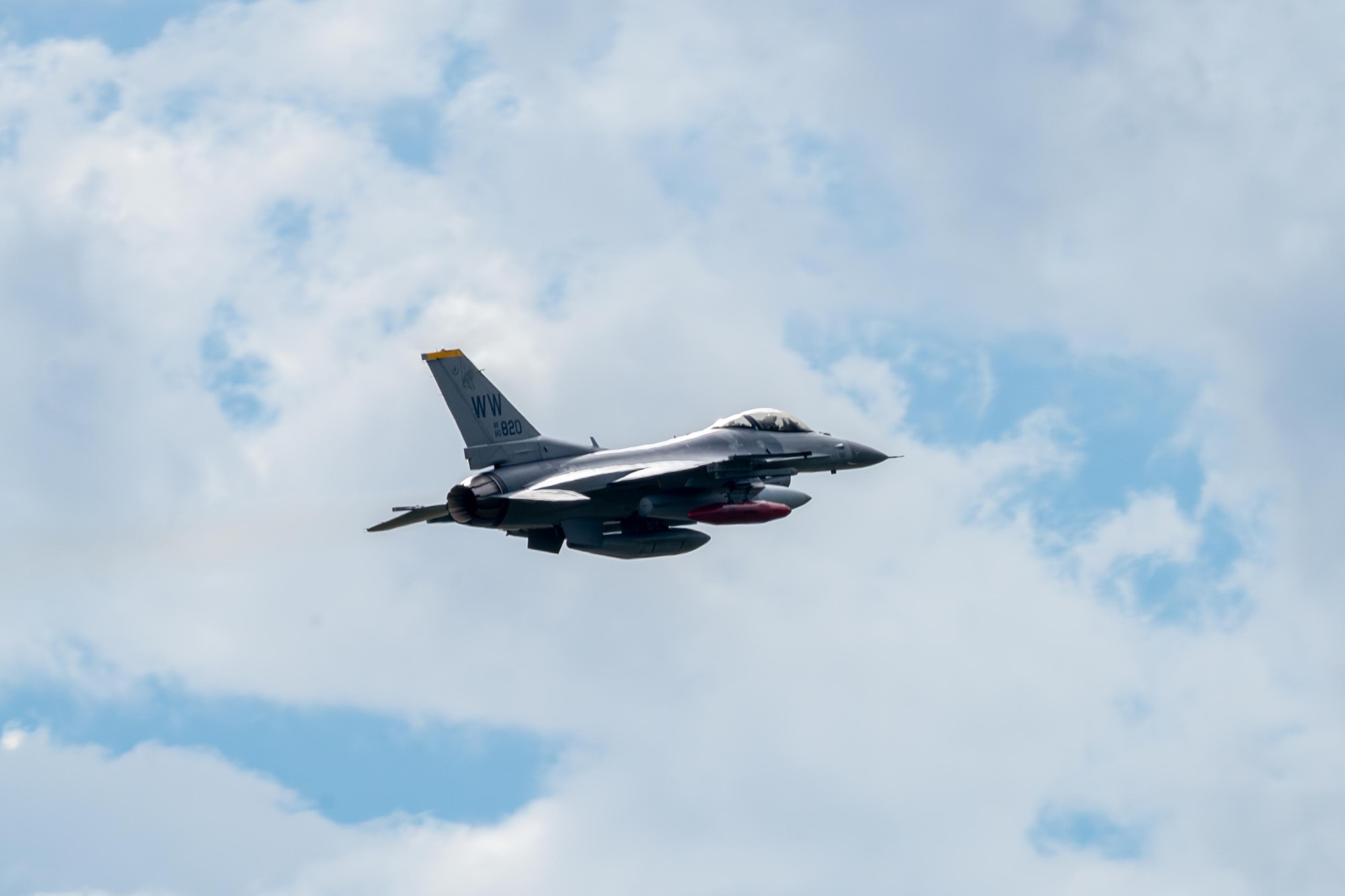 A U.S. Air Force F-16 Fighting Falcon assigned to the 13th Fighter Squadron (FS) departs for the last time.
