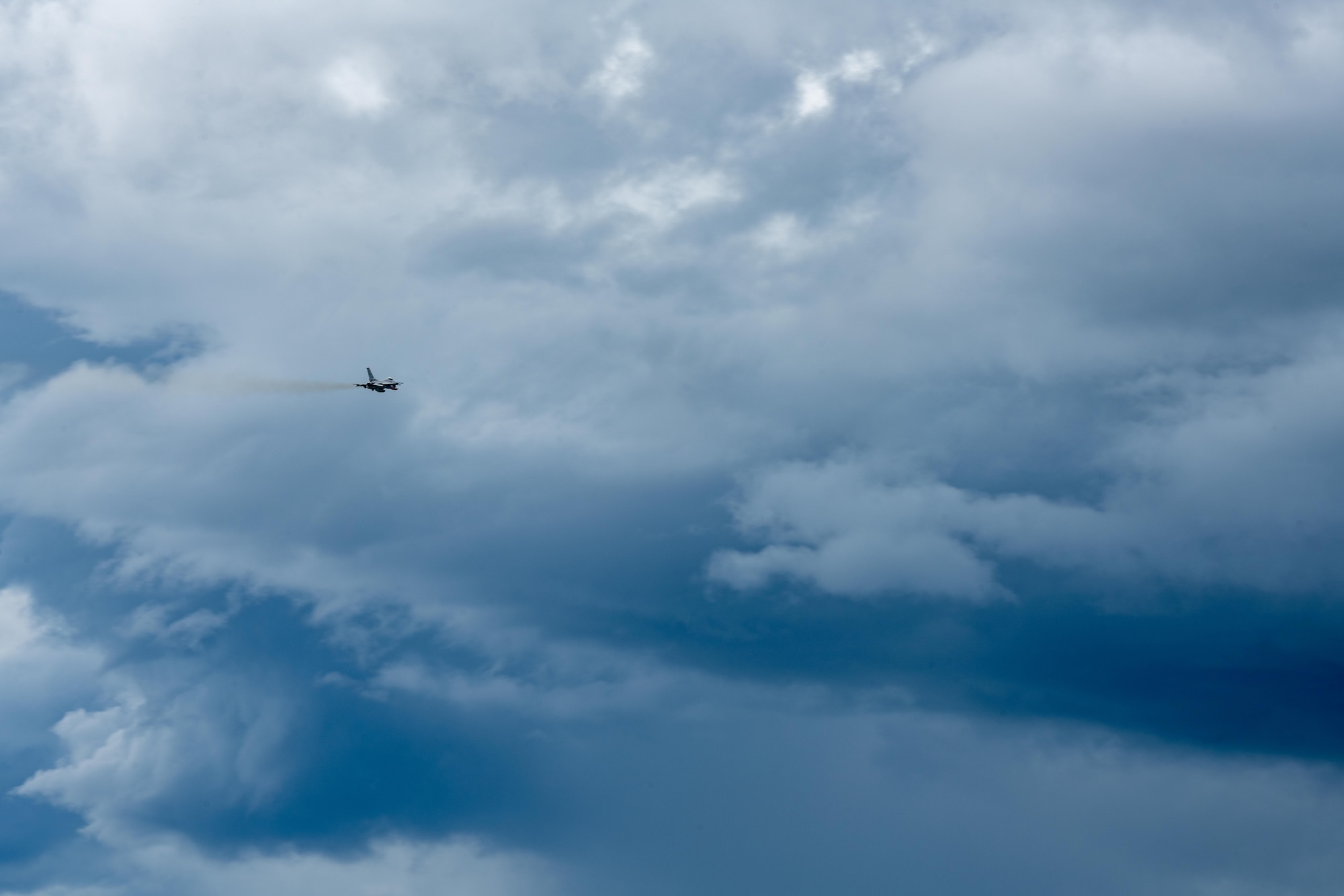 A U.S. Air Force F-16 Fighting Falcon assigned to the 13th Fighter Squadron departs for the last time.