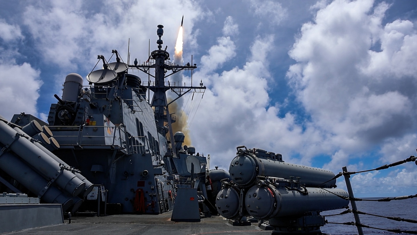 The Arleigh Burke-class guided-missile destroyer USS Higgins (DDG 76) fires a missile as part of a training exercise during Pacific Vanguard 2025 in the Philippine Sea, Sept. 1.