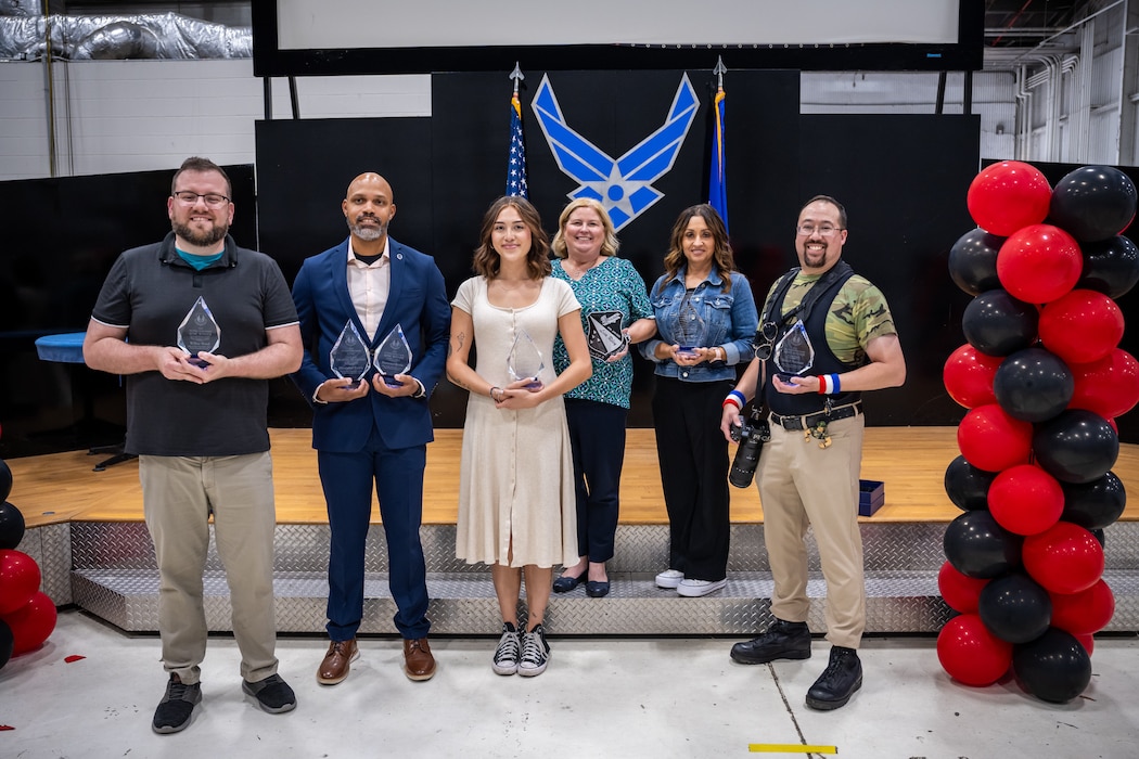 88th Air Base Wing Public Affairs receives their awards during the Wing Staff Agency All Call at Wright-Patterson Air Force Base, Aug. 28, 2025. The all call recognized award winners for their contributions throughout the quarter. (U.S. Air Force photo by Daniel Peterson)