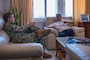 The Spanish admiral speaks on a sofa with Rear Adm. Rosen.