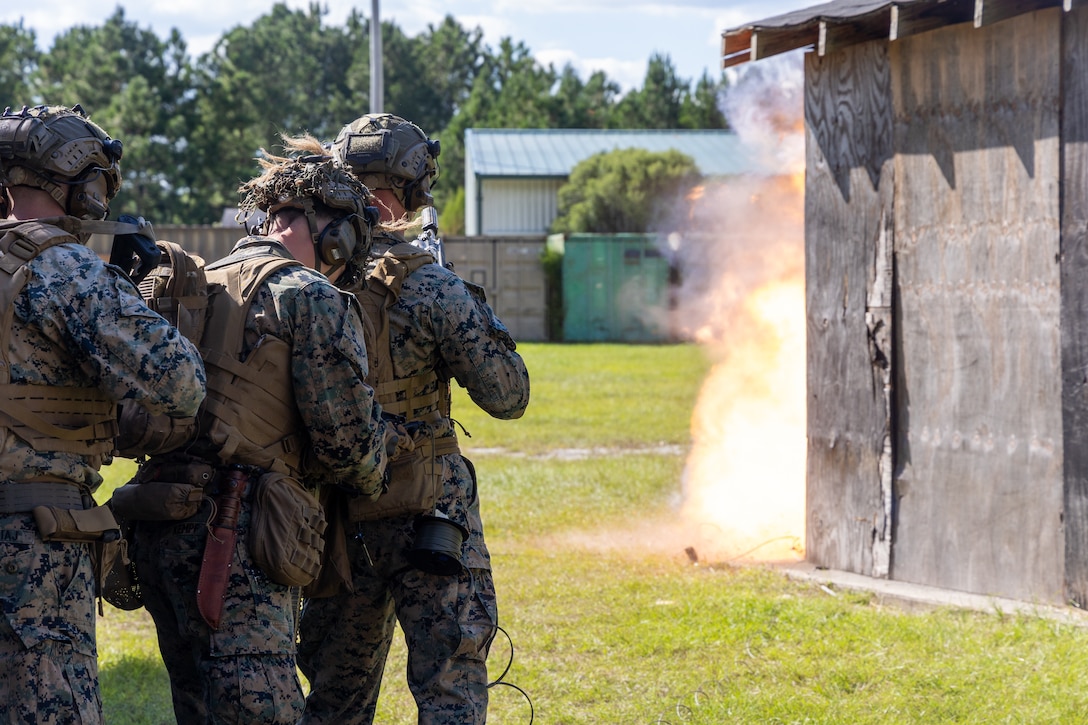 U.S. Marines with Fox Company, 2nd Battalion, 2nd Marine Regiment breach a doorway during a demolition range at Marine Corps Base Camp Lejeune, North Carolina, Aug. 7, 2025. 2nd Bn., 2nd Marines, the ground combat element of Special Purpose Marine Air-Ground Task Force – Alert Contingency MAGTF, conducted a demolition range to improve the battalion’s ability to clear obstacles and familiarize Marines with different types of explosive charges. (U.S. Marine Corps photo by Lance Cpl. Jack Labrador)