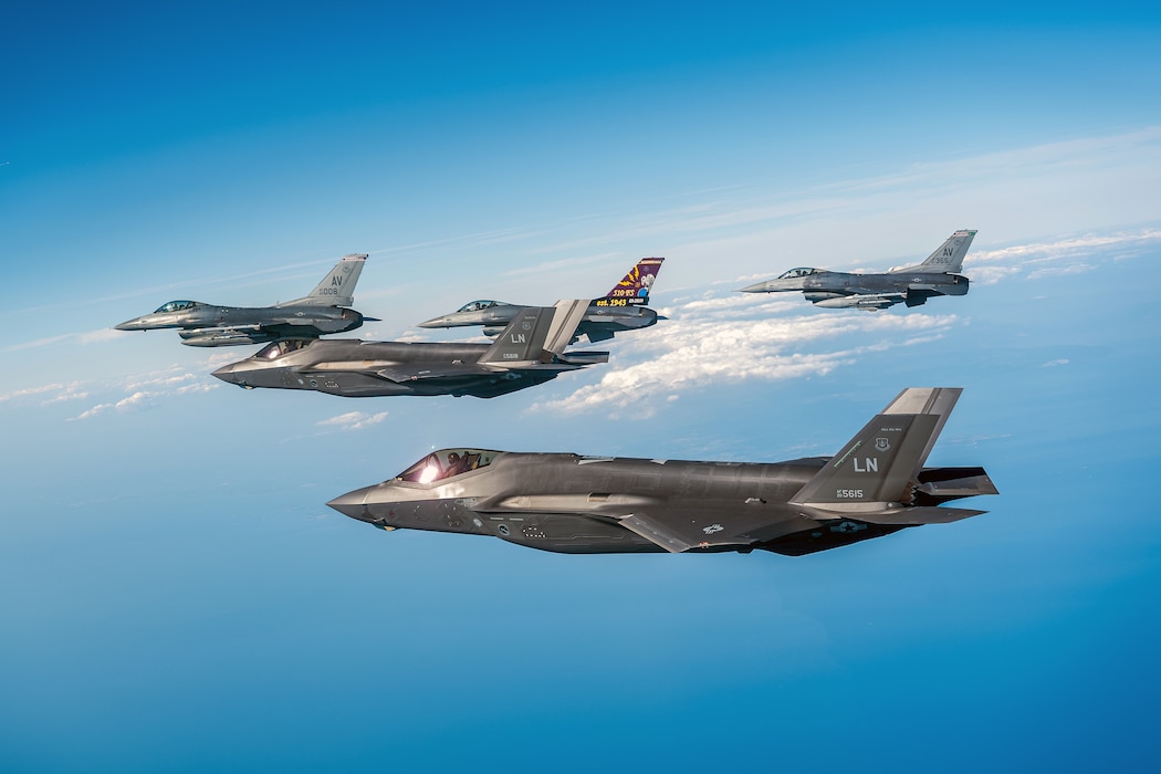 F-35s and F-16s flying in formation