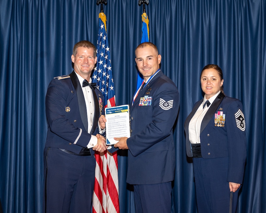 The newest members of Team Wright-Patt senior NCOs pose for photos during an induction ceremony at the National Museum of the United States Air Force, Aug. 22, 2025 (U.S. Air Force photos by Daniel Peterson)