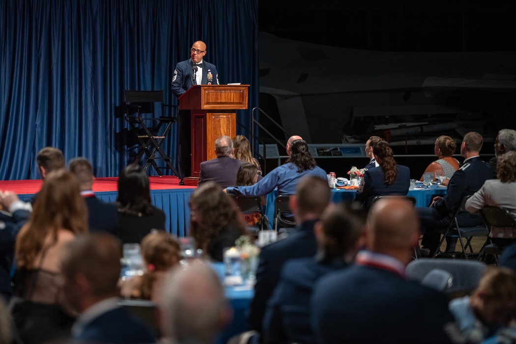 Chief Master Sgt. Michael Sierra, 88th Mission Support Group Command Chief, congratulates the newest Team Wright-Patt senior NCOs during an induction ceremony at the National Museum of the United States Air Forces, Aug 22. 2025. (U.S. Air Force photos by Daniel Peterson)