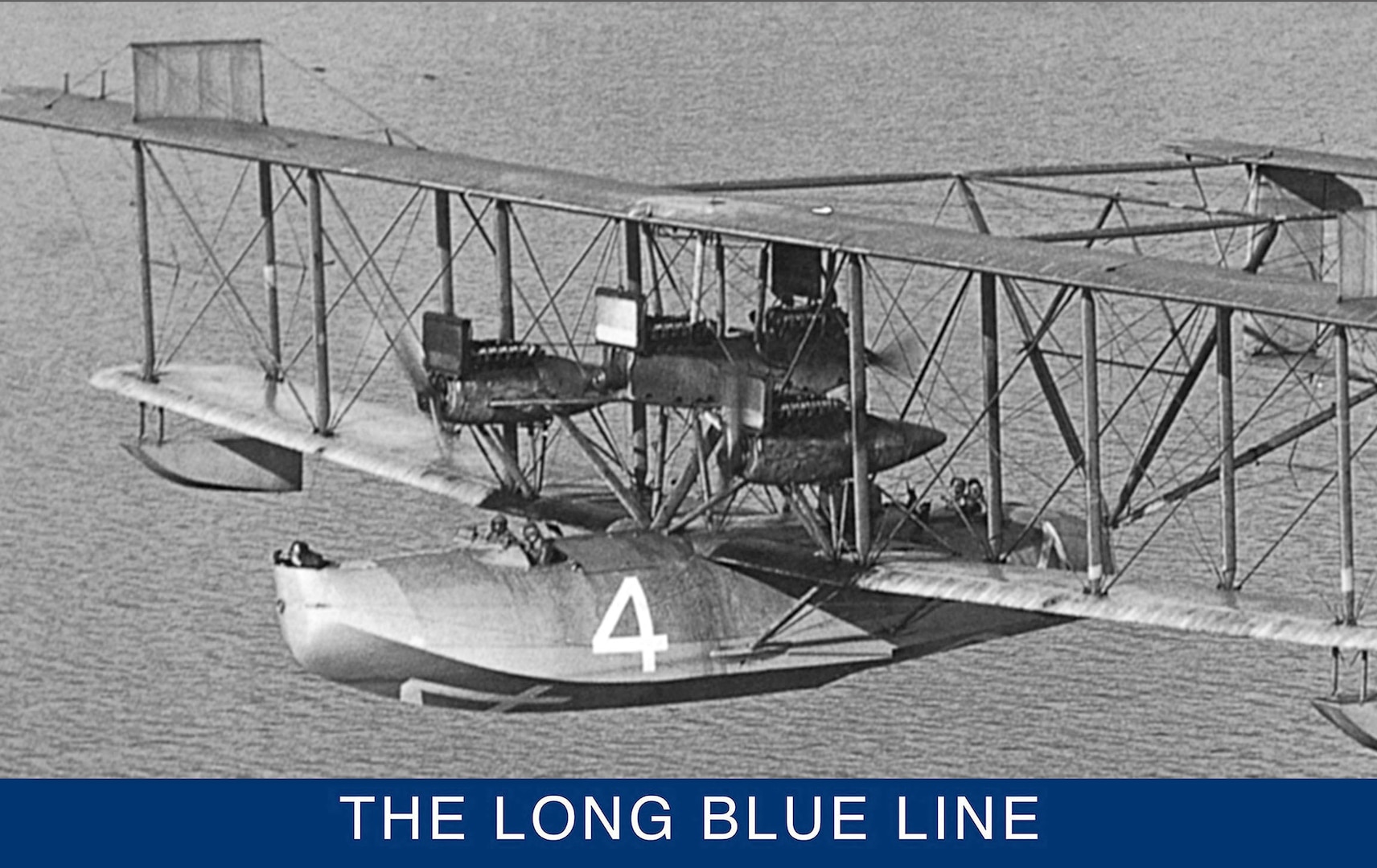 Pictured is a rare photograph of NC-4 during flight operations. NC-4 had three forward-facing tractor engines and one center-mounted pusher engine. (Naval History and Heritage Command)