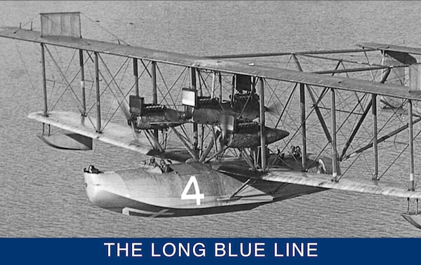 Pictured is a rare photograph of NC-4 during flight operations. NC-4 had three forward-facing tractor engines and one center-mounted pusher engine. (Naval History and Heritage Command)