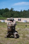 Capt. Patrick Randall, recruiting and retention officer for the New Hampshire Army National Guard, shoots at a 35-yard target during the “All Army Pistol Team Match,” the final event of the 2025 New Hampshire National Guard Combat Marksmanship Competition at Fort Devens on July 16, 2025.