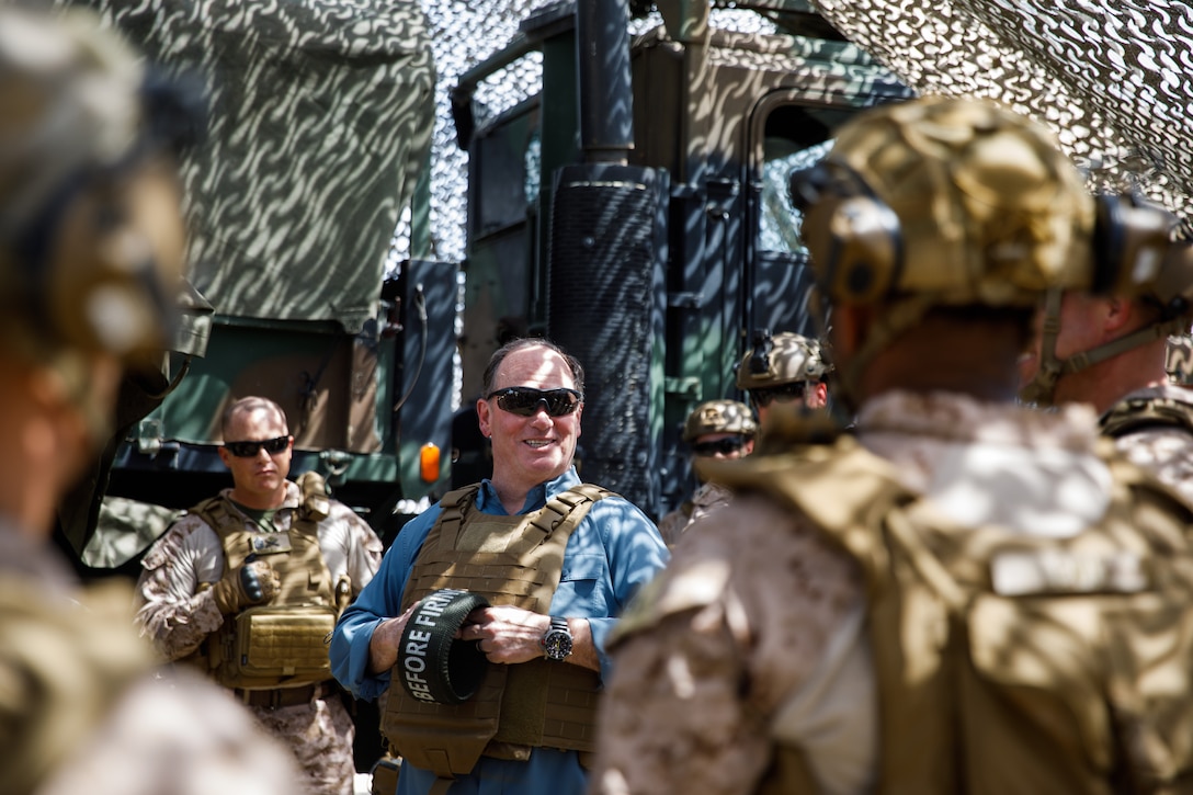 Secretary of the Navy, John Phelan, speaks to U.S. Marines with 2nd Battalion, 11th Marine Regiment, 1st Marine Division after firing an M777A2 lightweight 155 mm howitzer as part of his visit to Marine Corps Base Camp Pendleton, California, August 27, 2025. The visit highlighted readiness, modernization, and quality of life priorities for Marines and Sailors across I Marine Expeditionary Force and the Navy–Marine Corps team. (U.S. Marine Corps photo by Sgt. Atticus Martinez)
