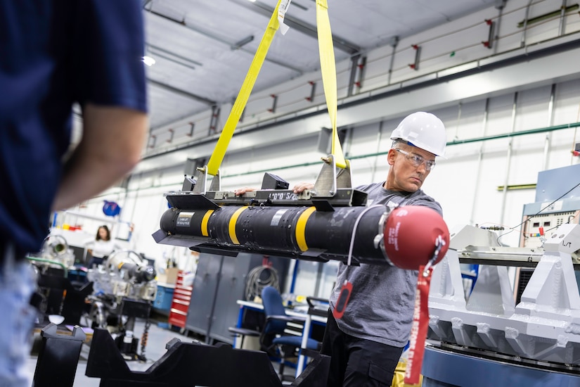 Bryan Zeger, Letterkenny Army Depot Directorate of Missile and Aerospace Readiness electronics technician, starts the process to test a Joint Air-to-Ground missile on Sept. 3 at the DMAR facility.