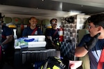 Fire fighters are inside the fire truck chatting before beginning their training mission.