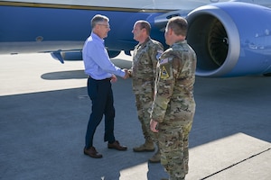 Secretary of the Air Force Troy Meink, left, greets Lt. Gen. Douglas Schiess, middle, Commander, U.S. Space Forces - Space; and United States Space Command’s Combined Joint Force Space Component Commander, alongside Col. James T. Horne III, Space Launch Delta 30 commander, during his visit to Vandenberg Space Force Base, Calif. Aug. 27, 2025. During his visit, Meink received a strategic overview of Vandenberg’s mission and its role in advancing US interests in space. (U.S. Space Force photo by Senior Airman Kevin Hernandez)