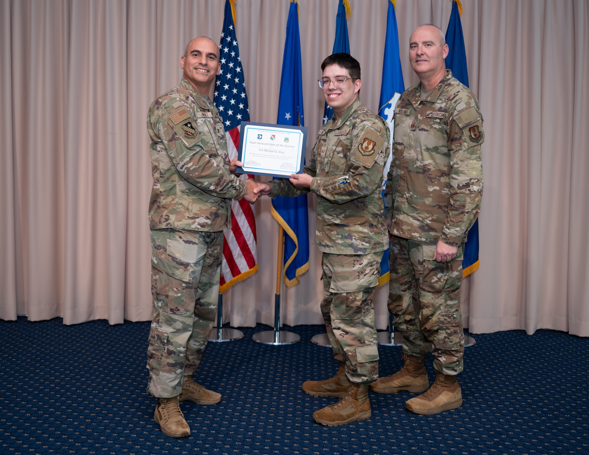 image of a person receiving an award.