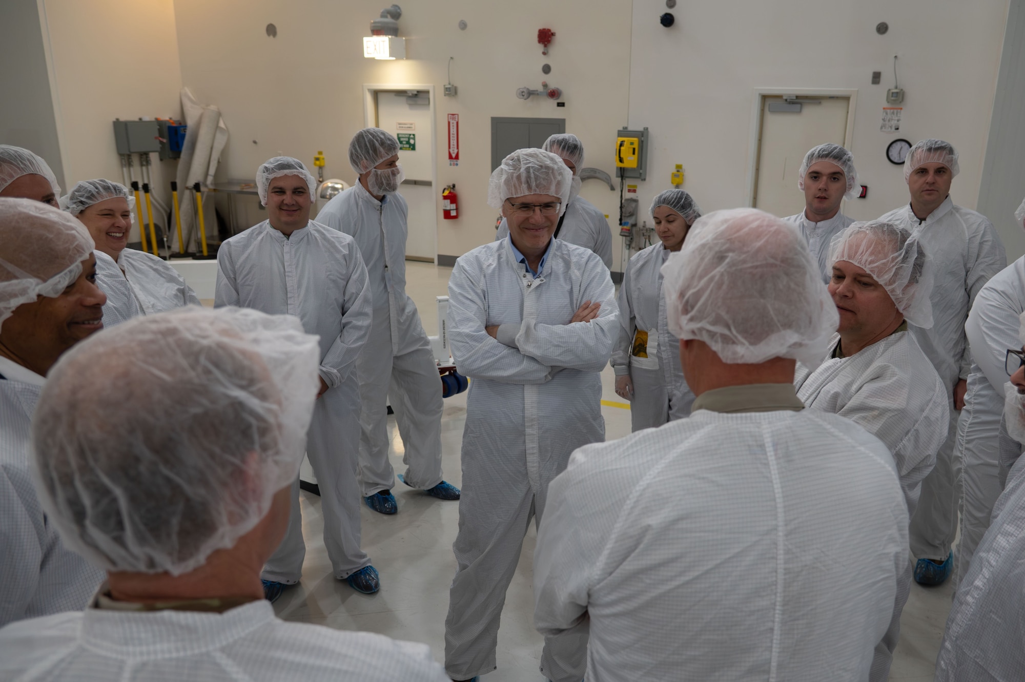 Secretary of the Air Force Troy Meink talks with Vandenberg leadership about Vandenberg’s strategic capabilities as the U.S. Space Force’s West Coast Spaceport and Test Range in a satellite processing facility at Vandenberg Space Force Base, Calif., Aug. 28, 2025. During the visit, Meink viewed the Space Development Agency’s Tranche 1 satellites slated to launch from the Vandenberg Spaceport no earlier than Sept. 10. This will be the first 21 of 126 Tranche 1 Transport Layer satellites to low-Earth orbit delivering next-gen capability to the joint warfighter to support terrestrial missions through development, fielding, and operation of the Proliferated Warfighter Space Architecture. (U.S. Air Force photo by Staff Sgt. Daekwon Stith)