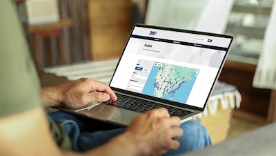 Image of person using laptop to visit findDHA tool.