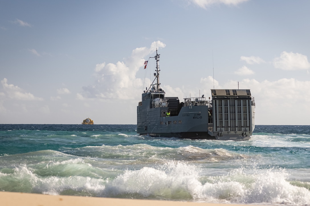 A U.S. Army Maneuver Support Vessel (Light) (MSV(L)) supported by 7th Transportation Brigade is utilized for on and offloading drills with U.S. Marines with 3d Littoral Logistics Battalion (LLB), 3d Marine Littoral Regiment, 3d Marine Division, on Marine Corps Base Hawaii, Aug. 26, 2025.