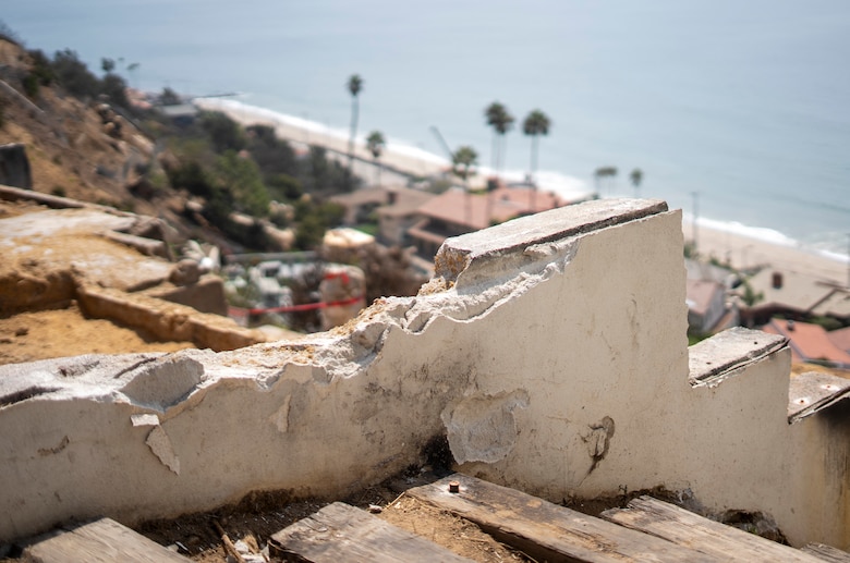Pictured Aug. 26 in the Los Angeles neighborhood of the Pacific Palisades are remnants of a home devastated by wildfires in January.