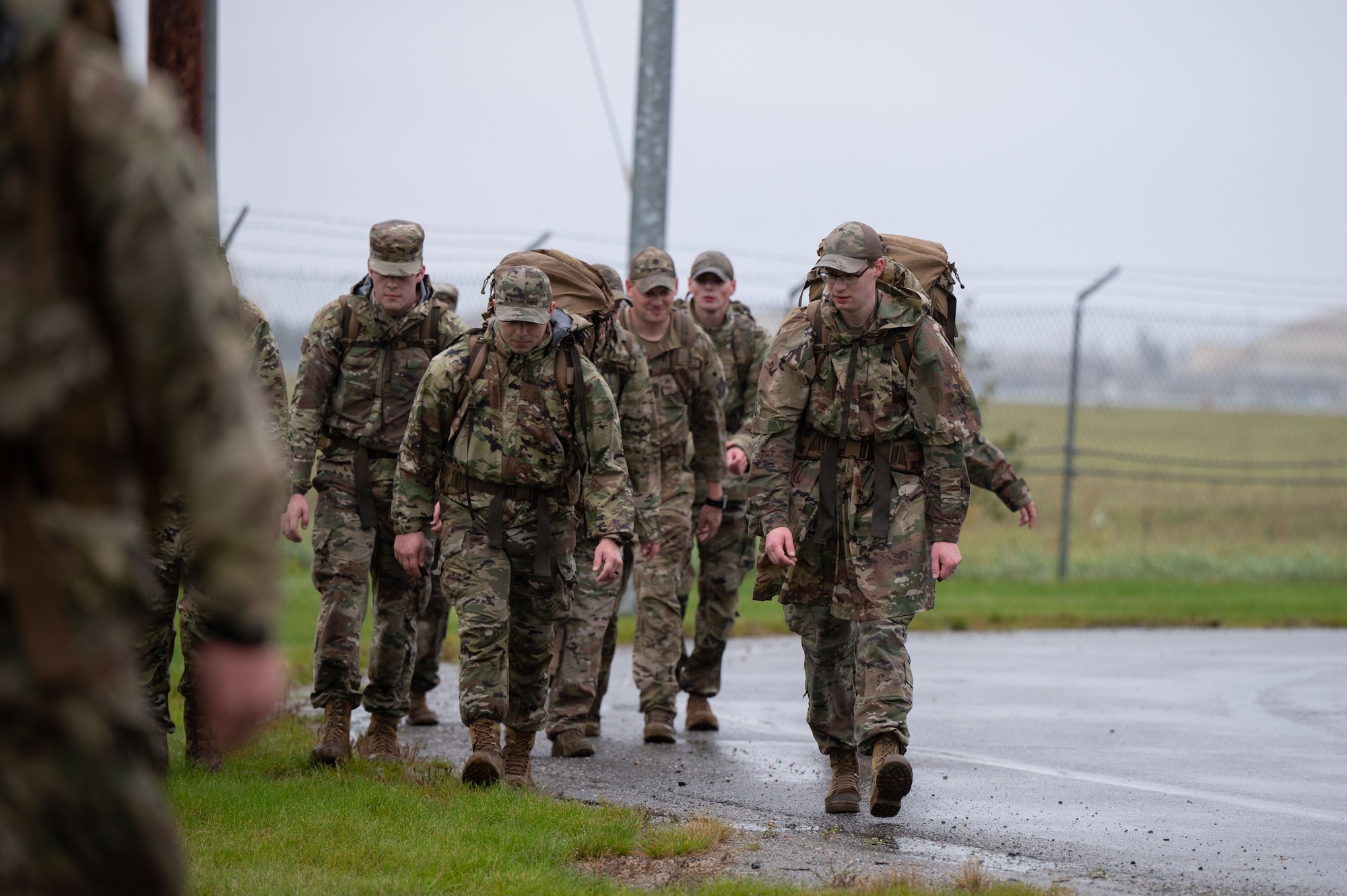 Airmen assigned to the 354th Civil Engineer Squadron march in the 11th Annual Explosive Ordinance Disposal Memorial Ruck at Eielson Air Force Base, Alaska, Sept. 5, 2025.